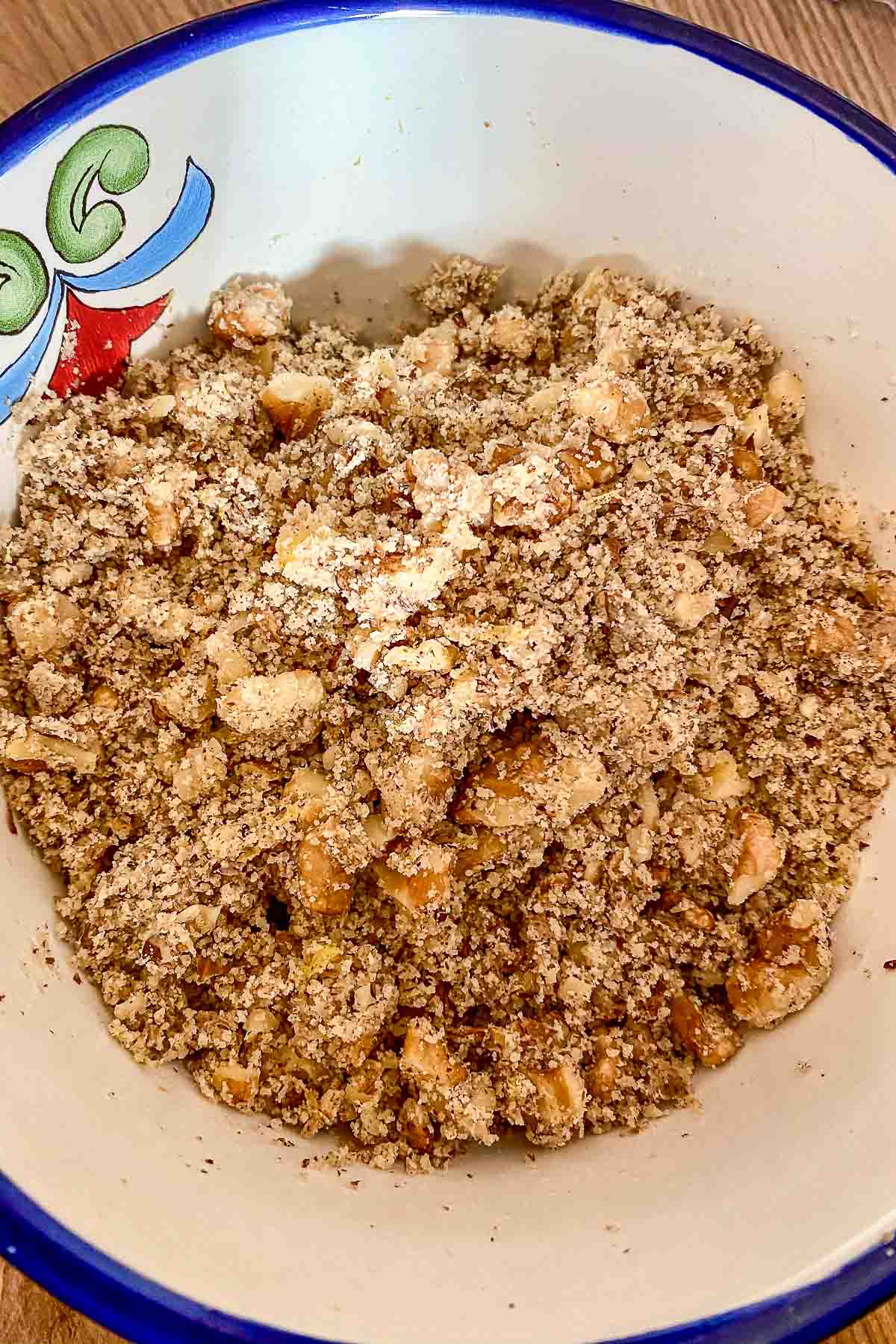 Grounded walnuts in a bowl.