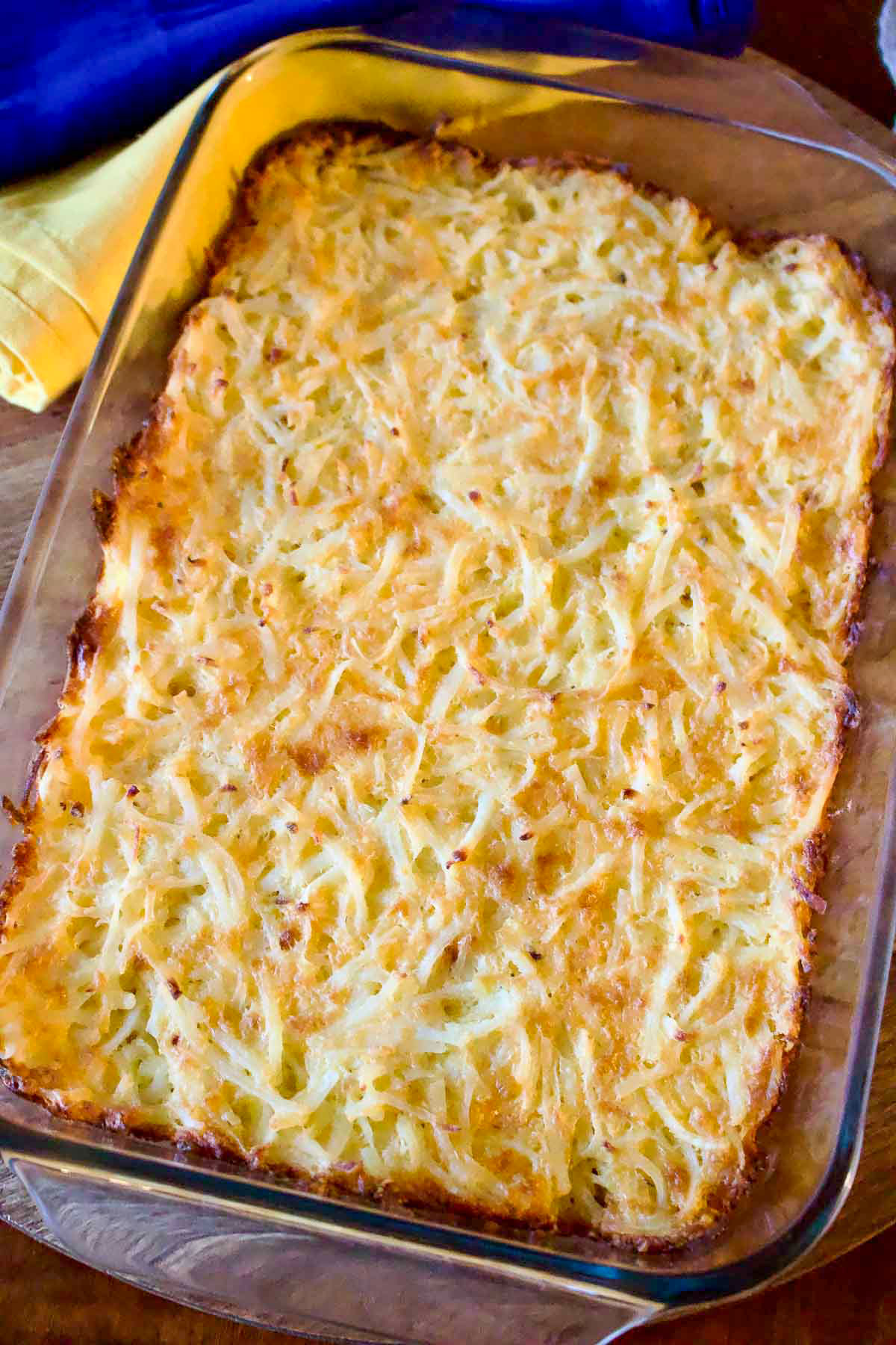 Delicious Cheesy Potatoes in a baking dish.