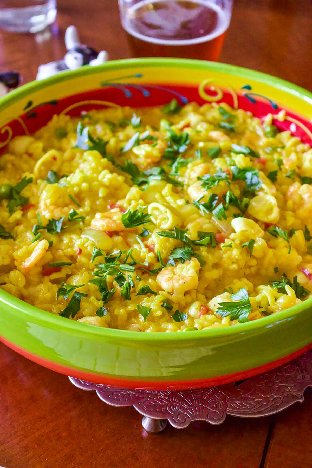 Yellow Rice With Seafood in a colorful serving bowl.