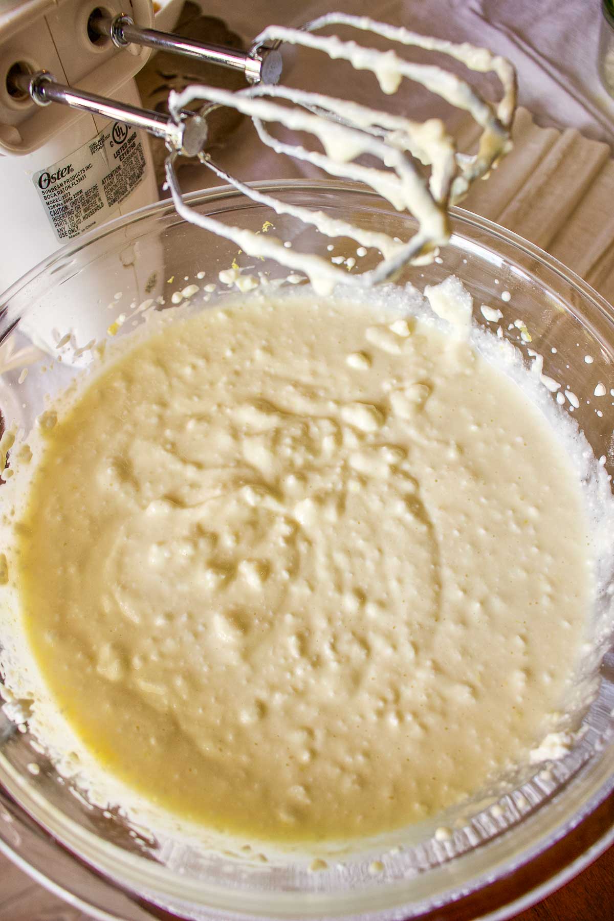 Preparing the cheese for the filling.