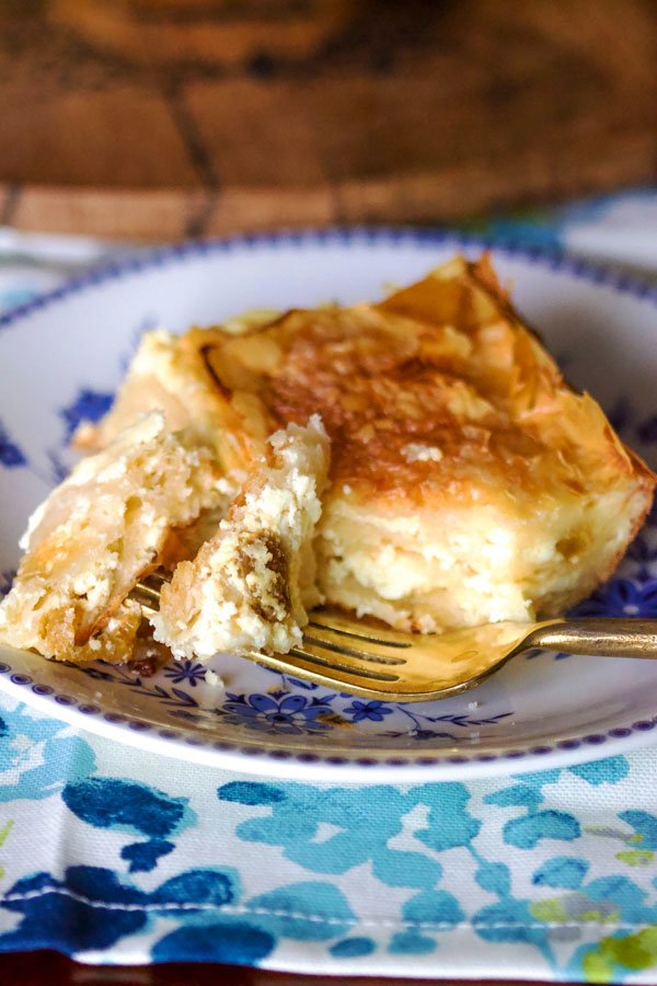 Sweet Cheese slab pie2626 Sweet Cheese slab pie slice on a blue and white plate