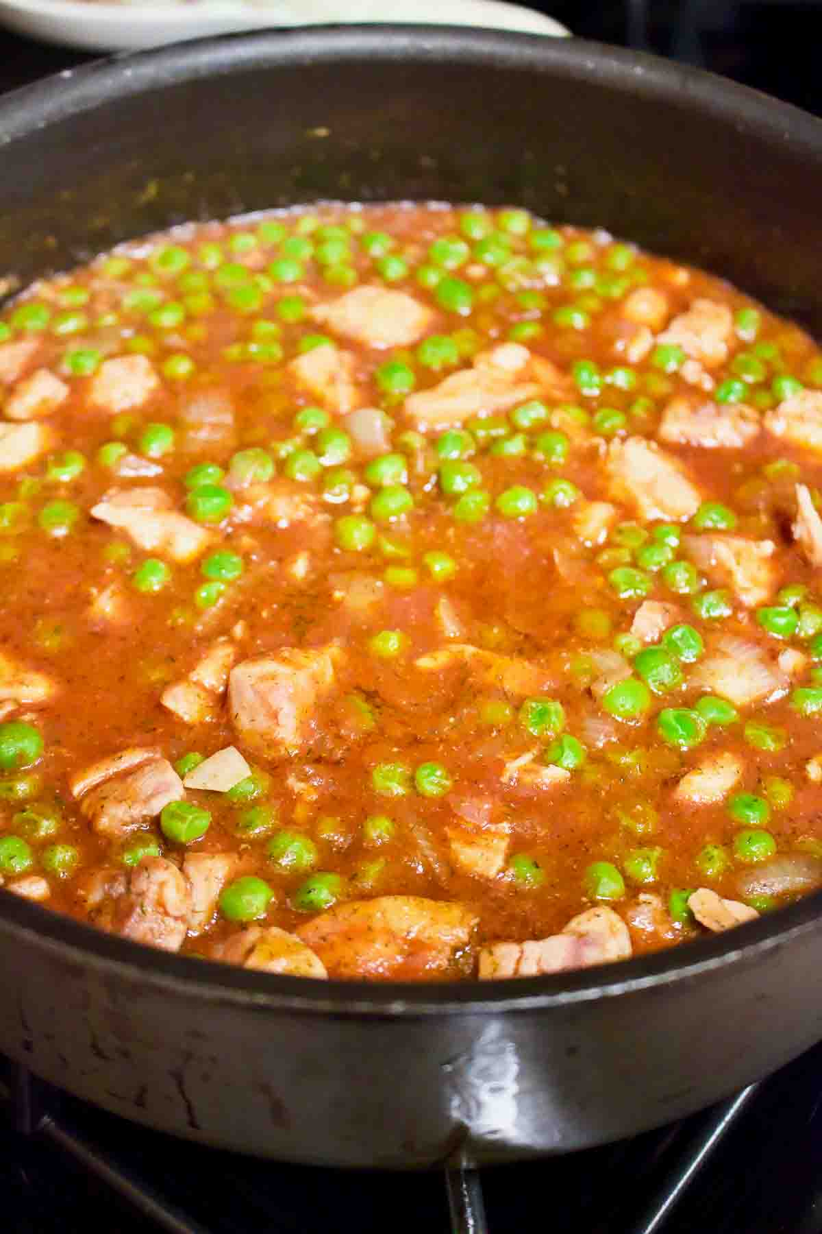 Green Peas With Chicken Stew Cooked In A Pan.