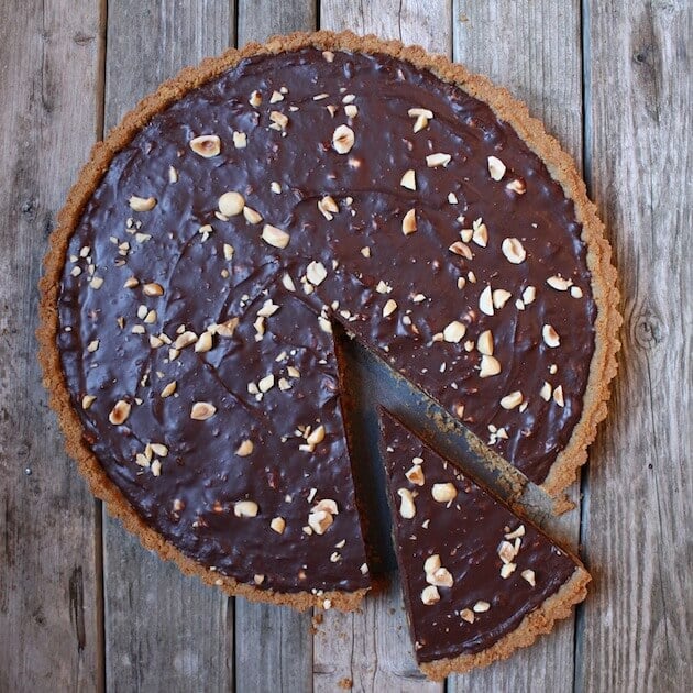 Chocolate Hazelnut Tart tart with slice out