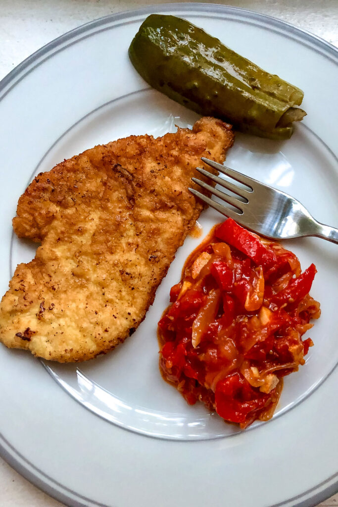 Lecso Hungarian Pepper Tomato Stew with schnitzel and pickles