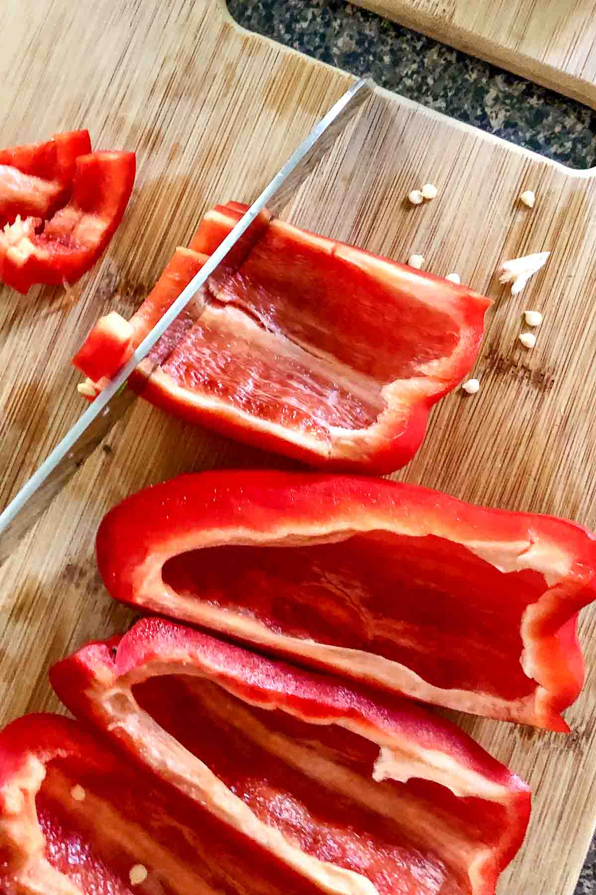 Slicing the peppers.
