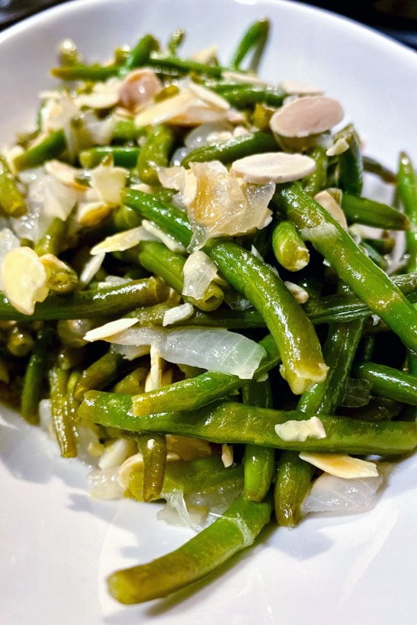 Green Beans Almondine Green Beans with Almonds1010 Green Beans Almondine on a white plate