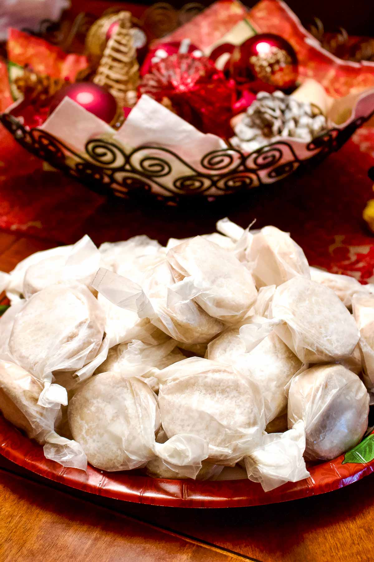 Lemon polvorones wrapped in wax paper.