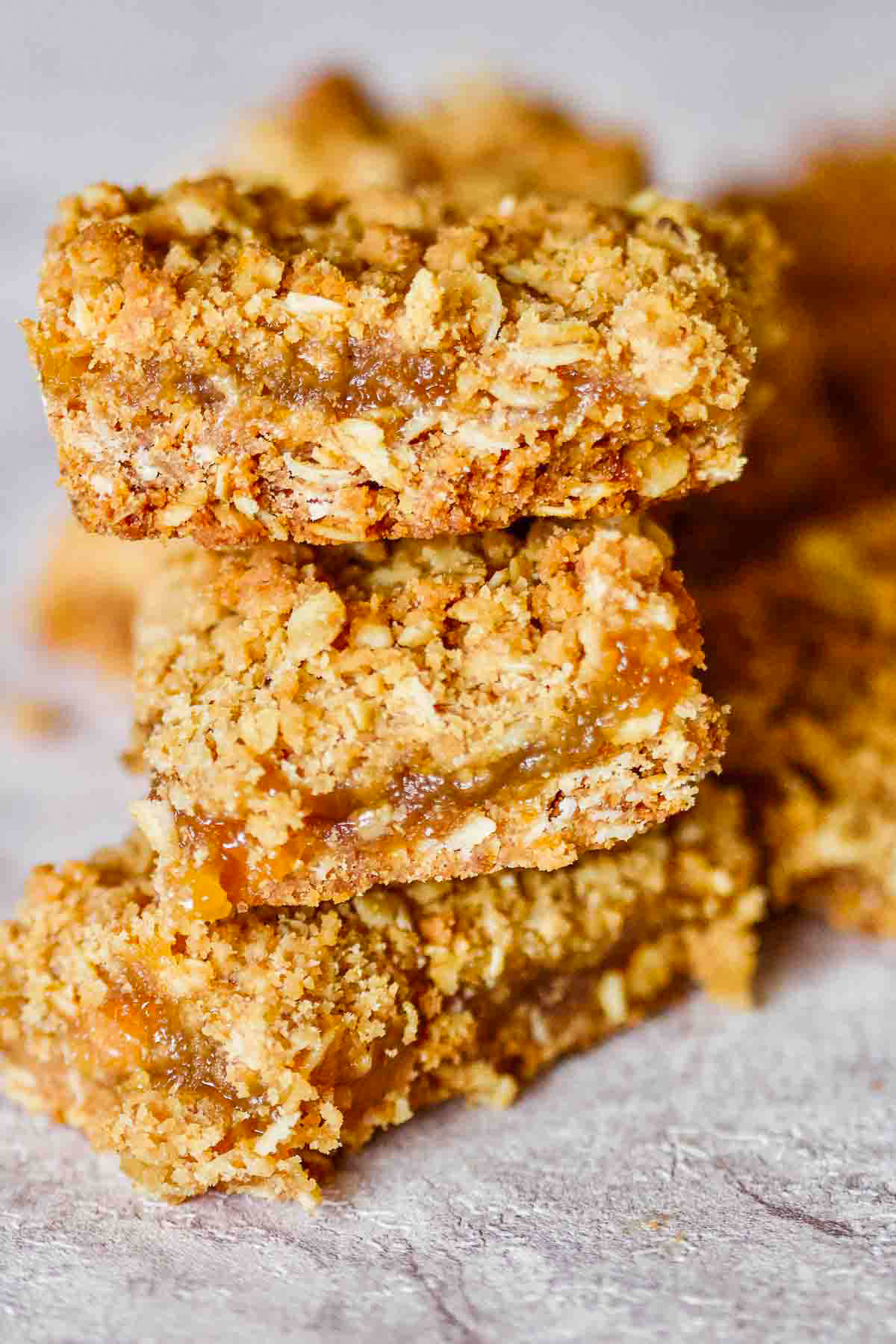 Apricot Oats Bars stacked on a platter.