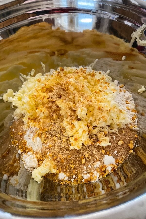 Ingredients for English scones in a metal bowl.