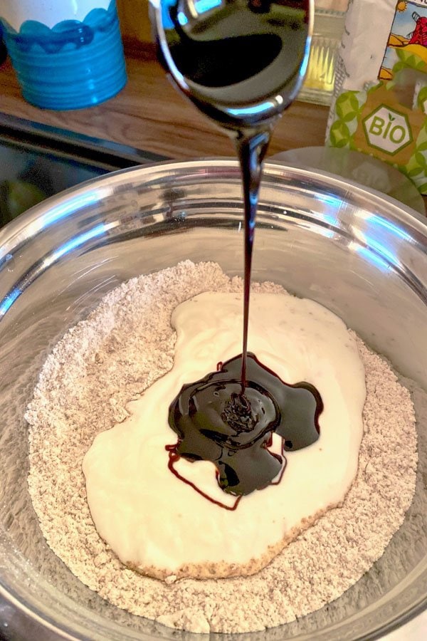 molasses  and buttermilk over the flour in a bowl