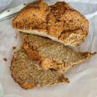 Irish Brown Soda Bread With Molasses on parchment paper.