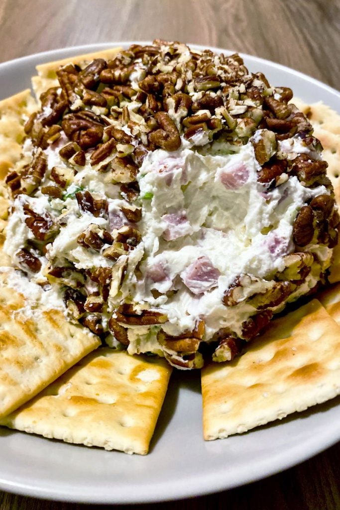 Cream cheese appetizer with ham, pineapple and pecans served with crackers