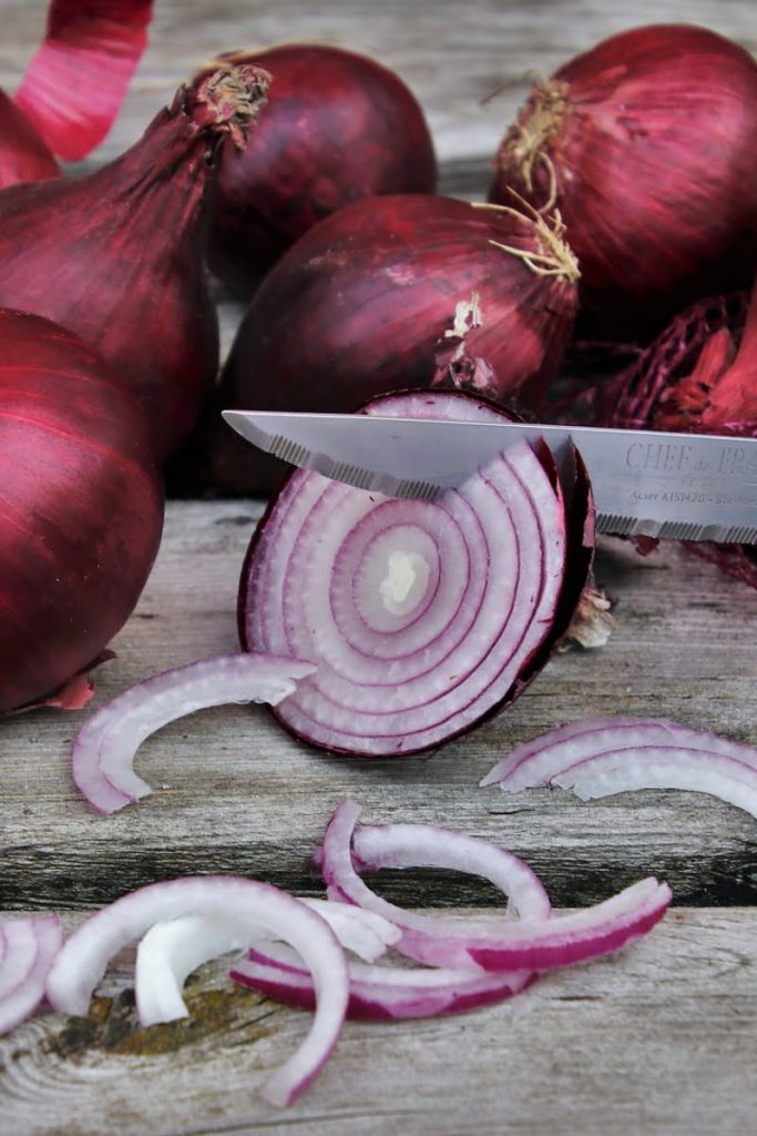 Red onions, some of them sliced
