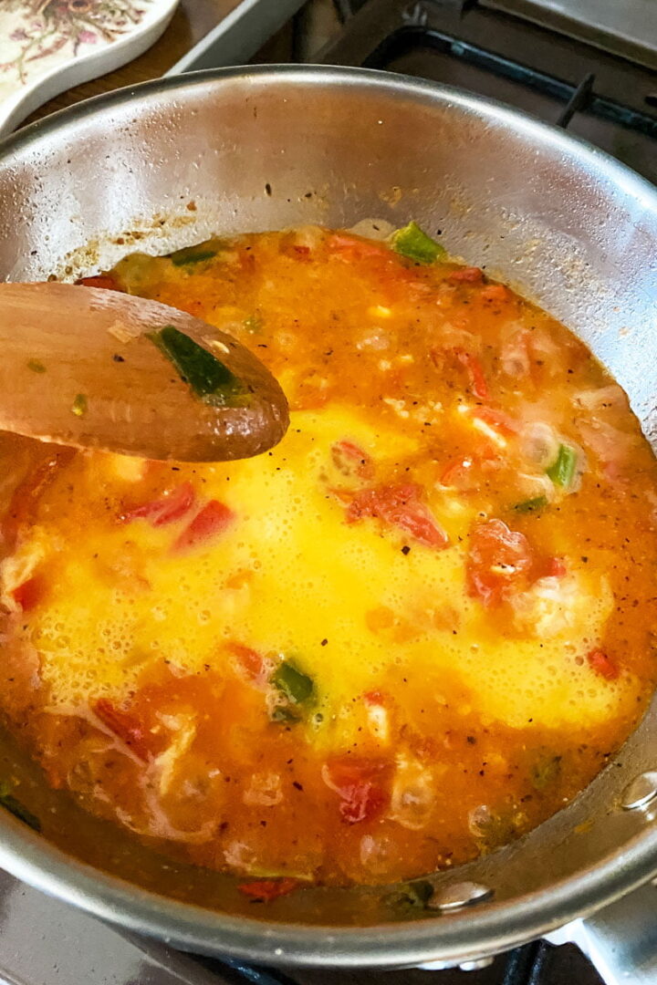 Fried peppers with tomatoes eggs and cheese