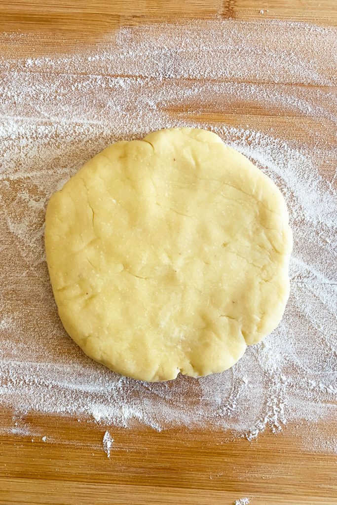 Pie dough on wooden board