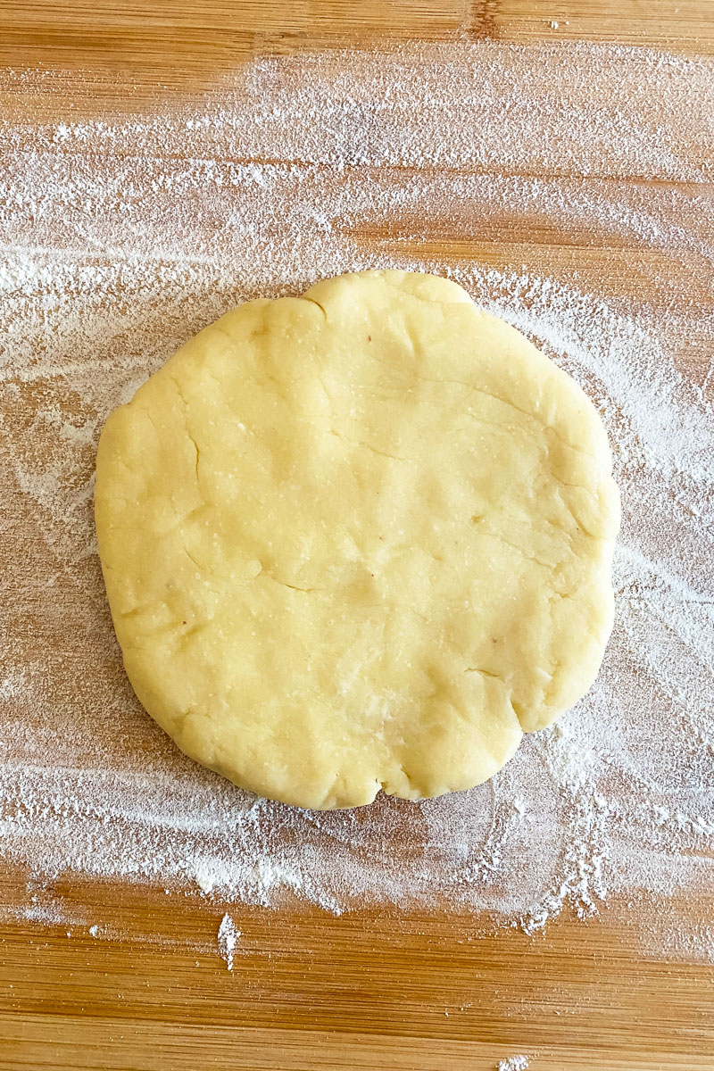 Pie dough on wooden board