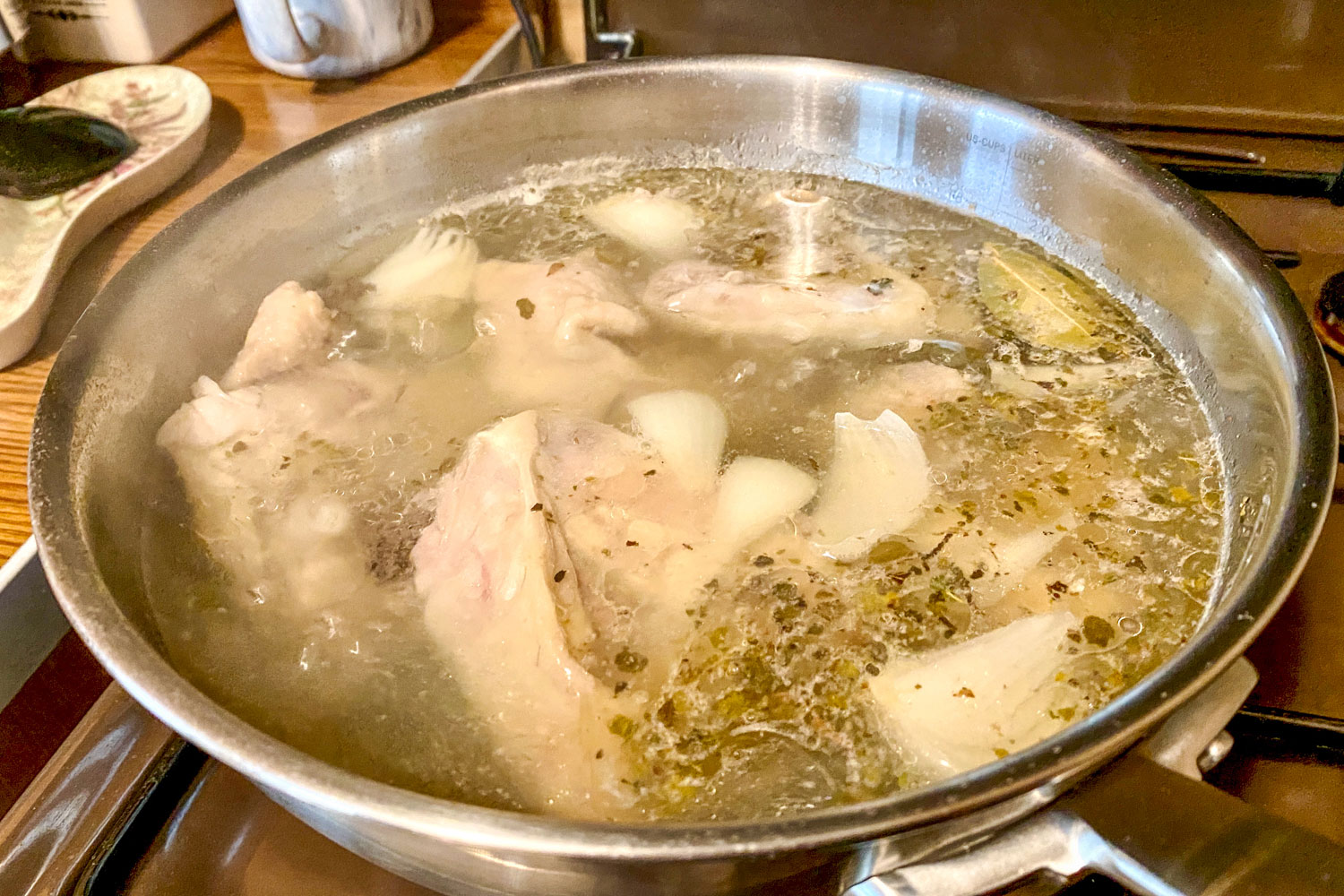 chicken cooking in the pot for chicken timga (tinga de pollo)