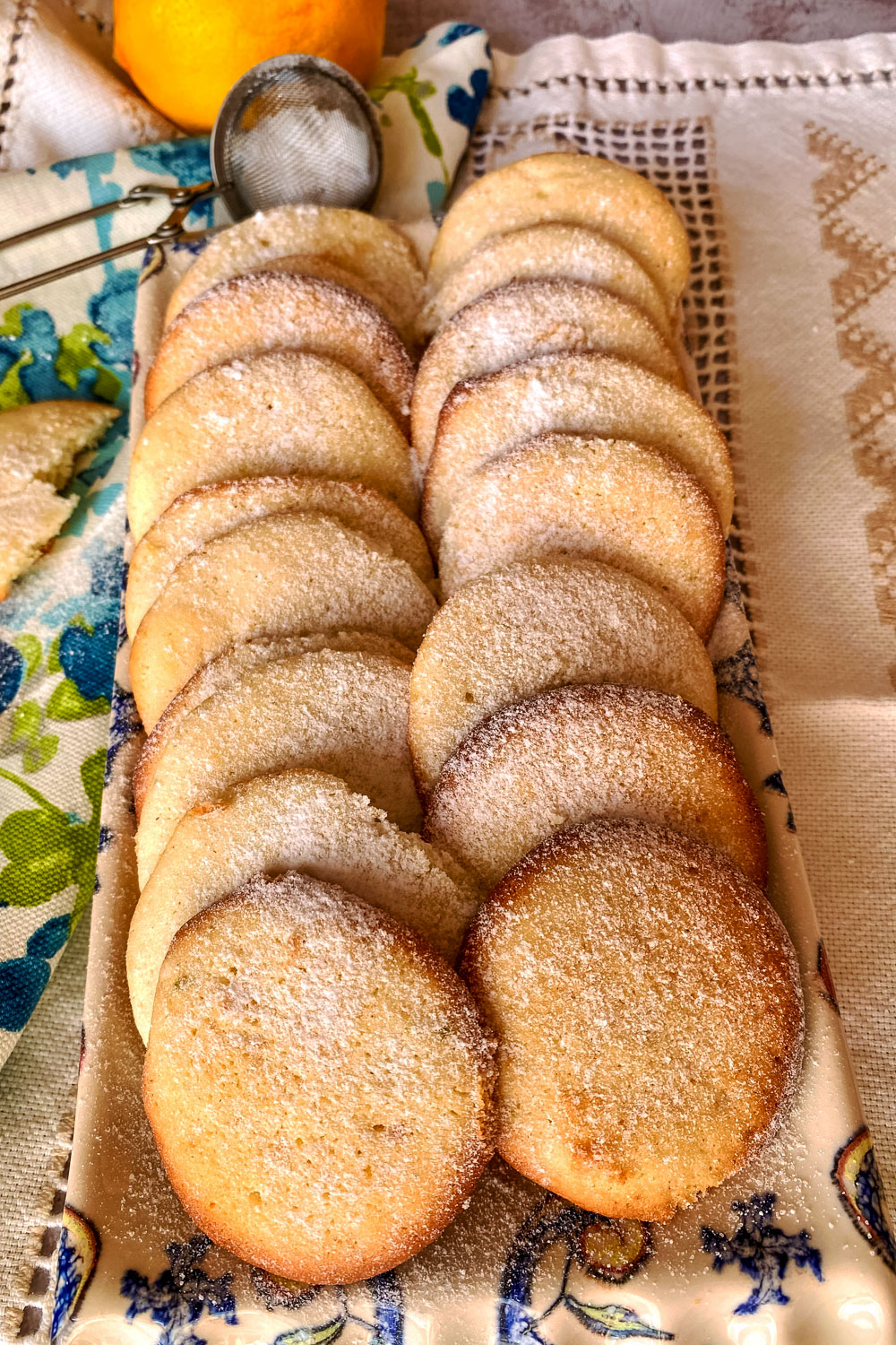 Lemon cream cheese cookies lined on platter0