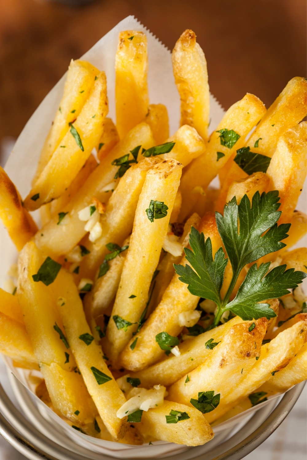 French fries with garlic and parsley