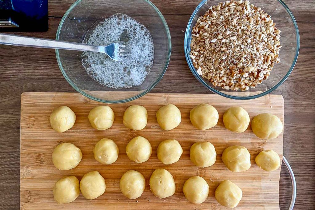 Cookie dough prepared for walnuts and egg white0