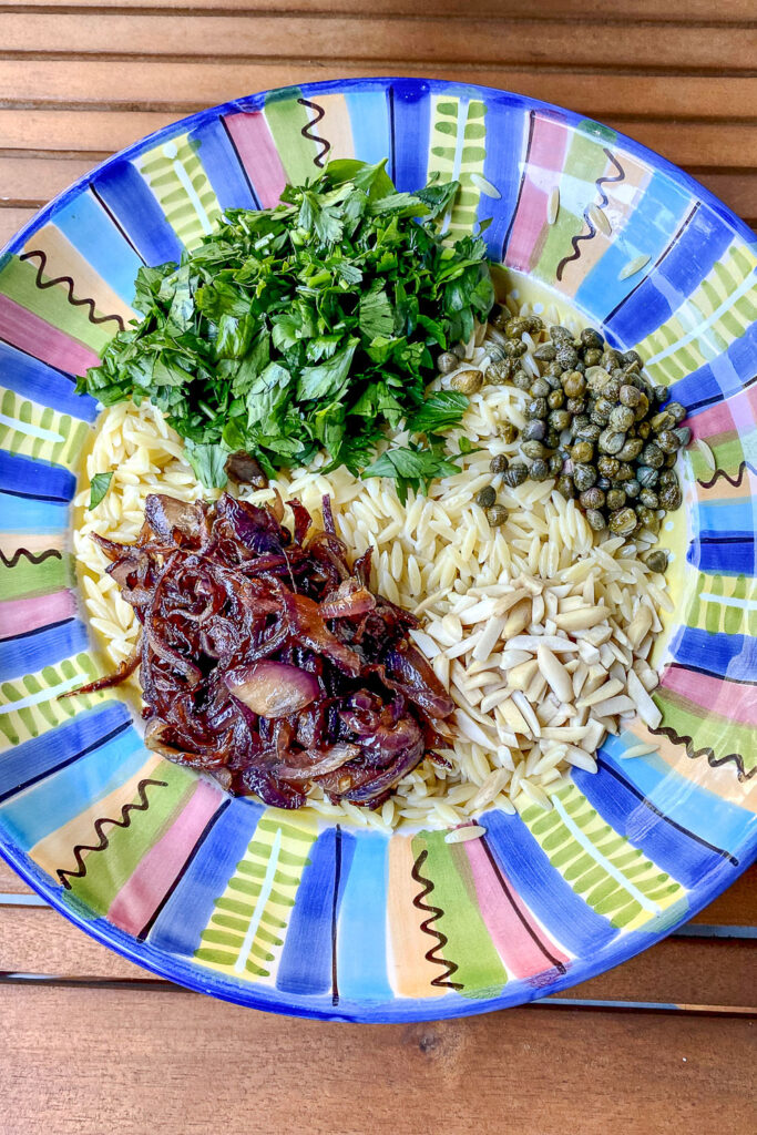 Assembling the orzo pasta salad