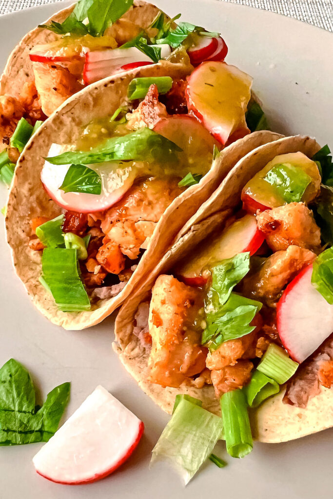 Chicken tacos close up white plate