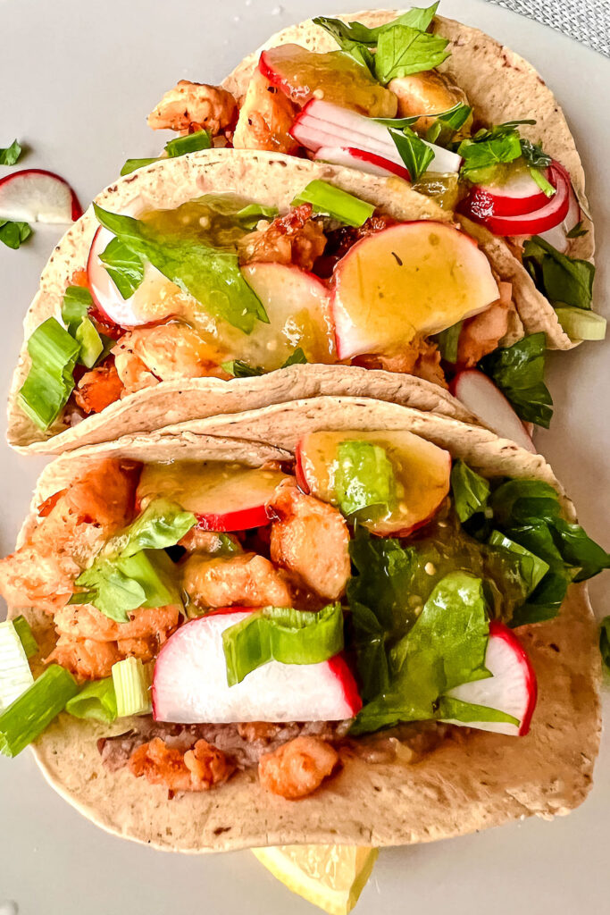 Chicken tacos on a white plate