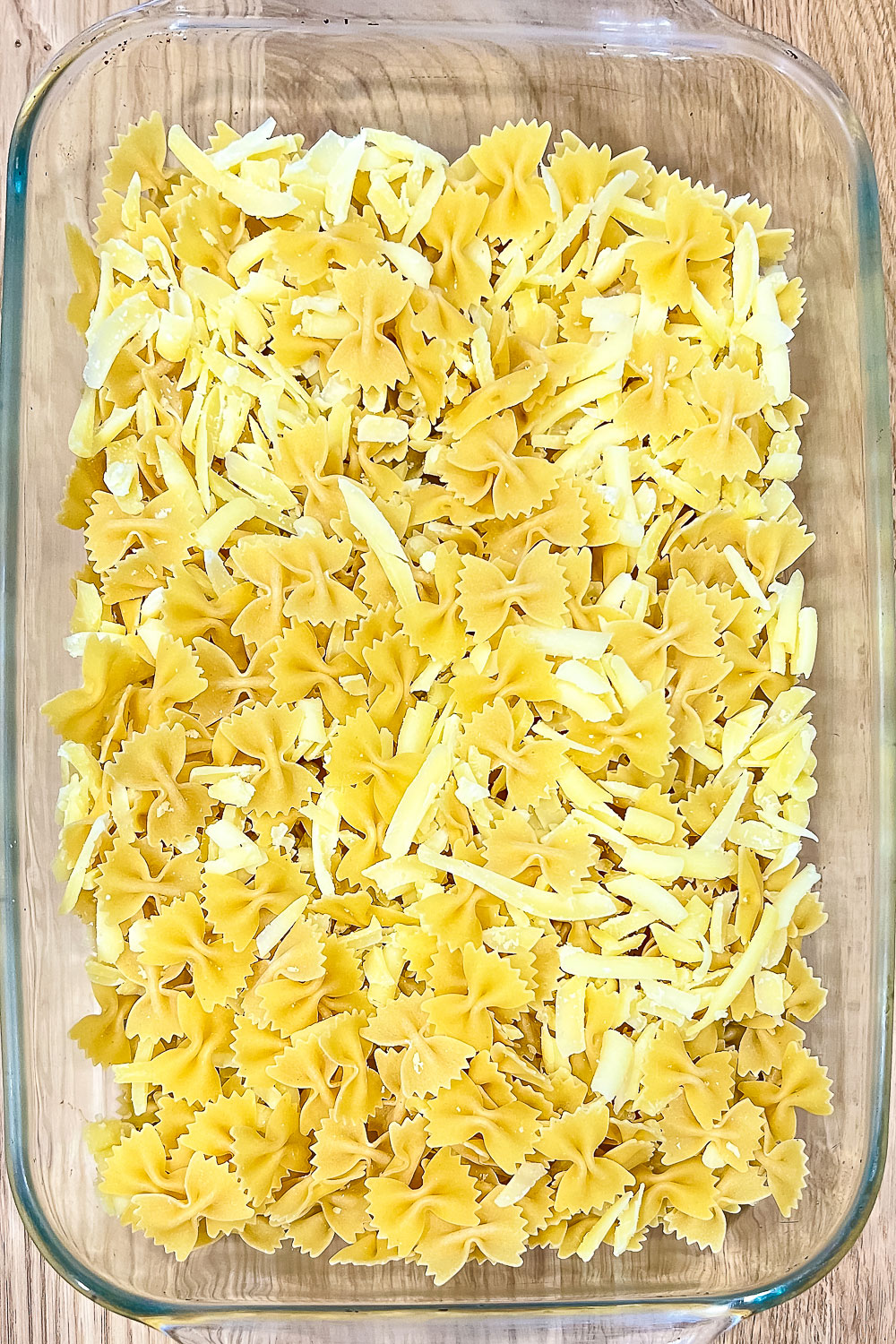 Mixed pasta and cheese in the baking pan