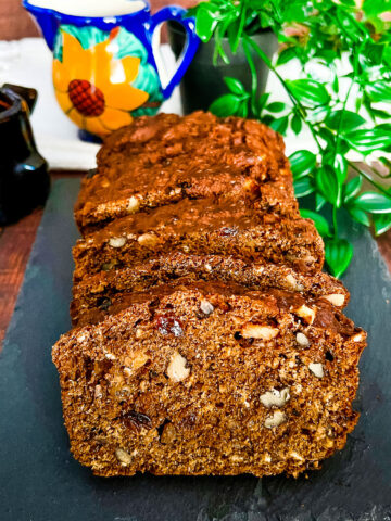 Apple Brown Bread with coffee and milk in the background0