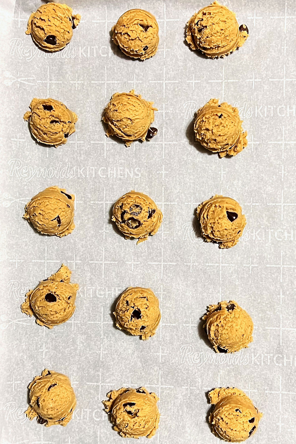 Raw cookies on parchment paper0