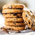 Stacked chocolate chip cookies square photo0