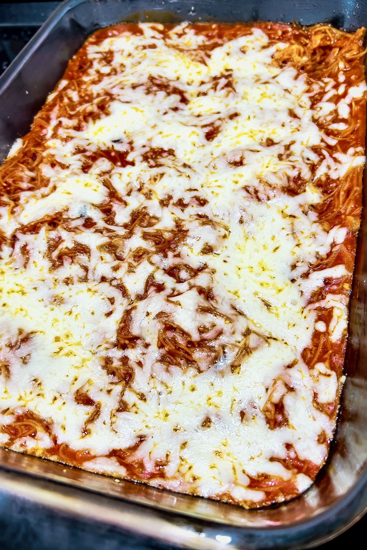Baked sopa seca in a glass baking dish0