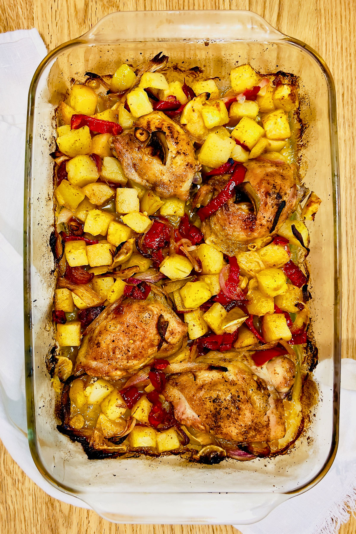 Harissa Roasted chicken with potatoes and limes overhead image0