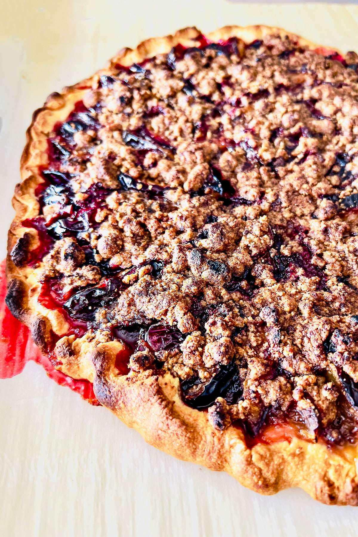 Plum crumble tart close up