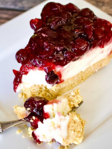 Philadelphia No Bake Cream Cheese slice on a white plate.