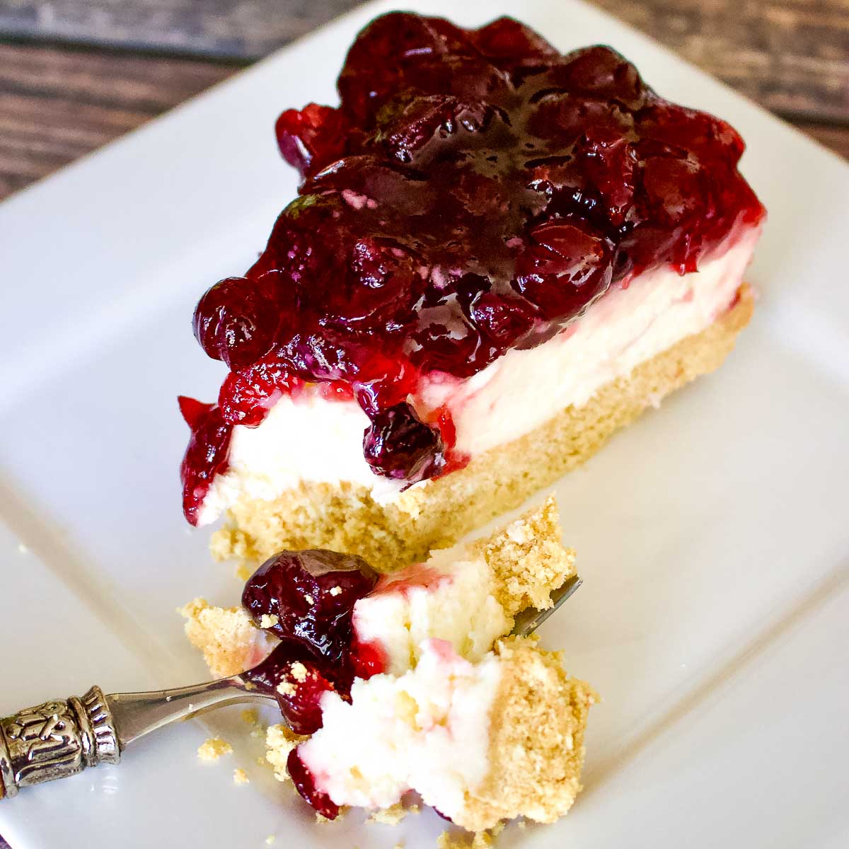 Philadelphia No Bake Cream Cheese slice on a white plate.