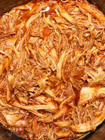 Delicious Chicken Tinga in a slow cooker- close up.