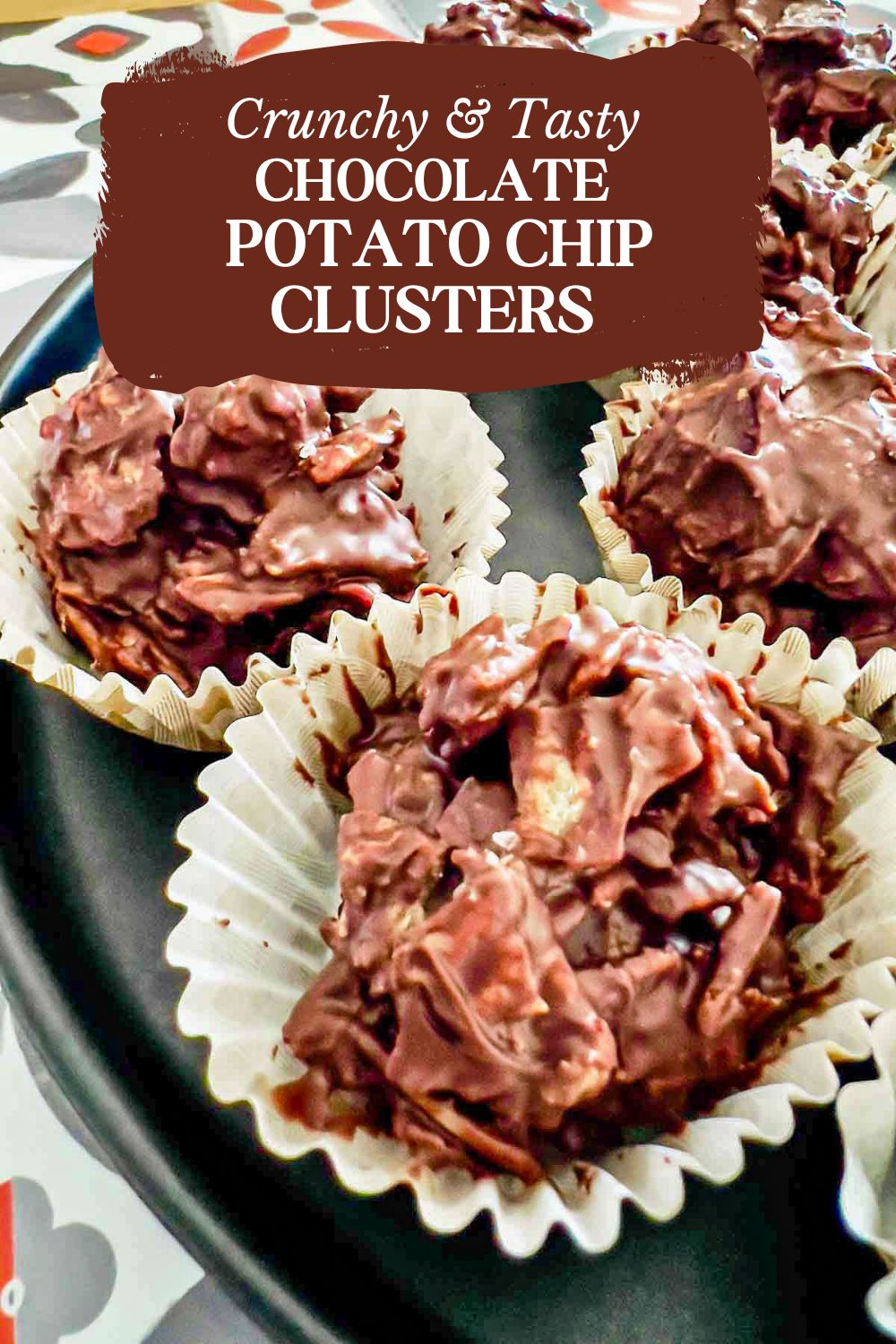 Chocolate Potato Chip Clusters on black platter