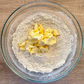 Dry ingredients with pieces of butter.