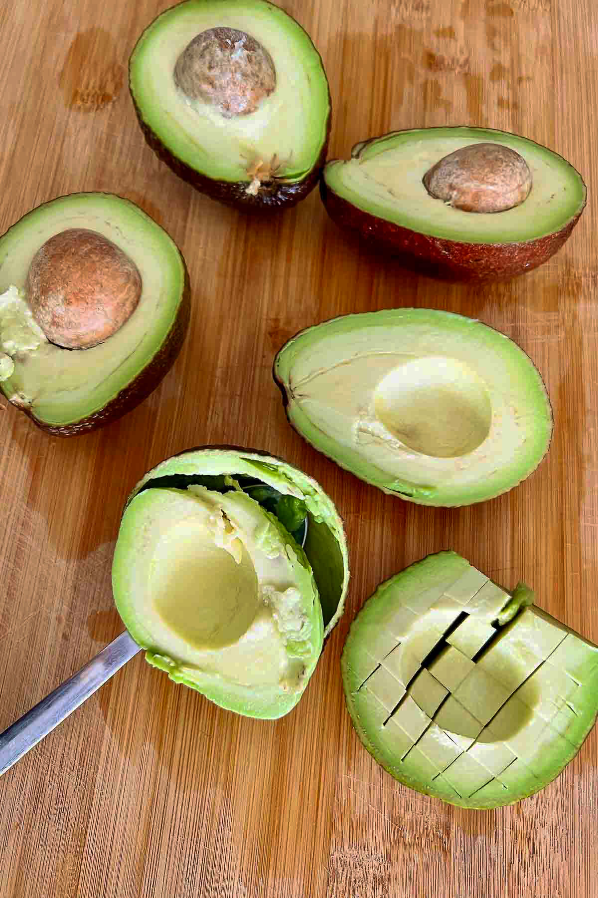 Avocados sliced in half.