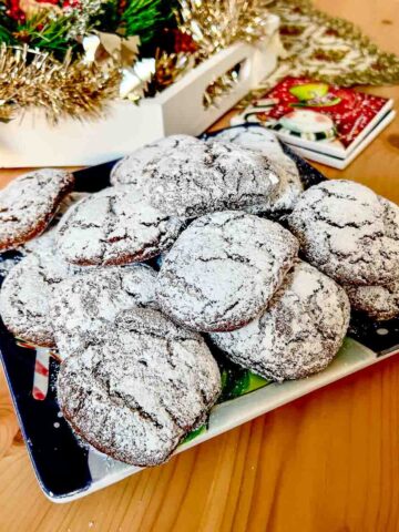 Spicy molasses cookies on a platter.