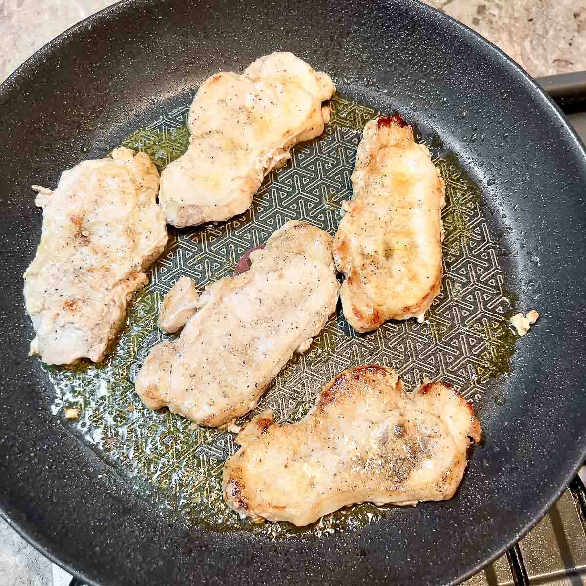 Pork Loin Thin Cuts Fried in the pan.