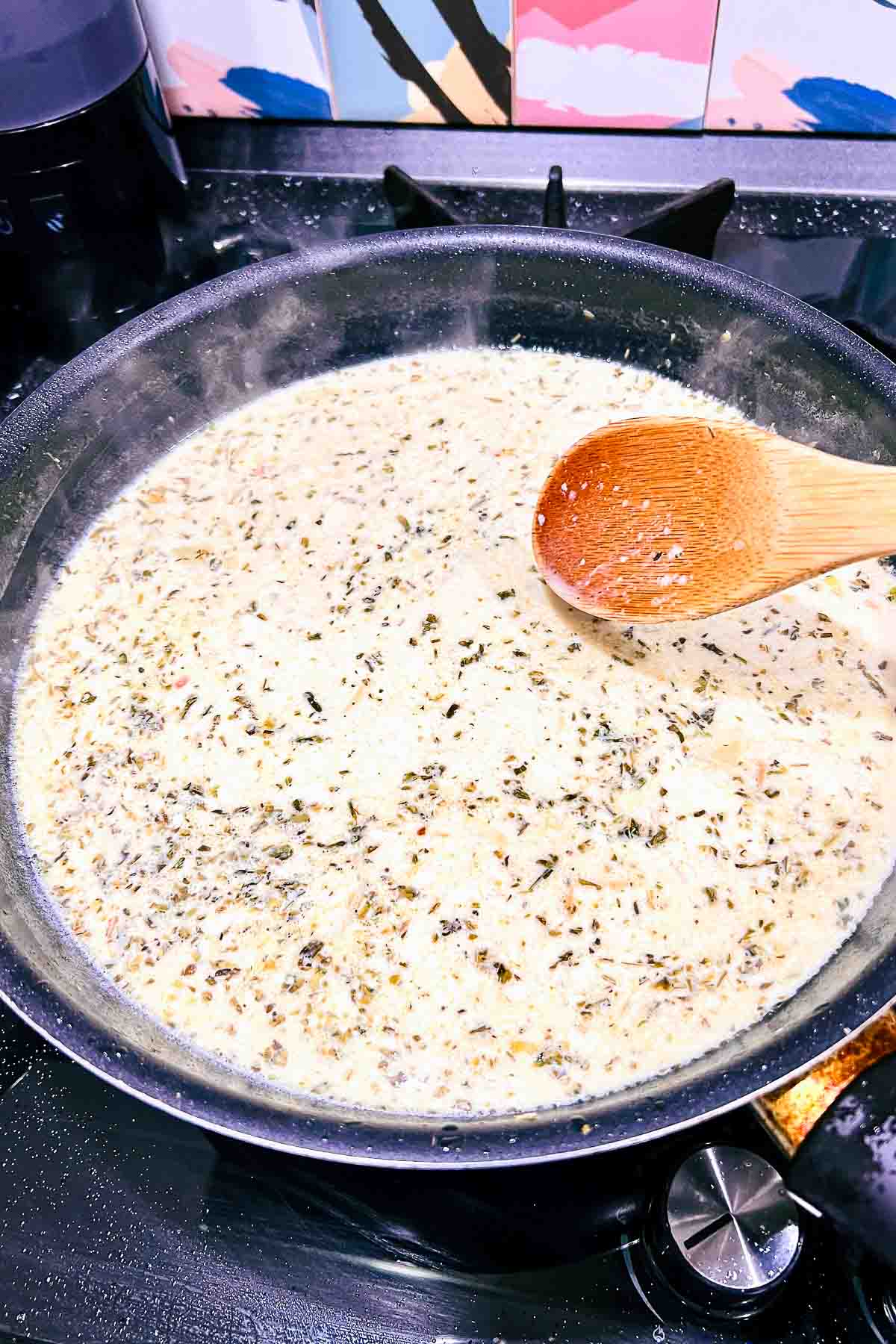 Making the mustard sauce in a pan.