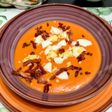 Spanish Porra Soup served with boiled egg and bacon.