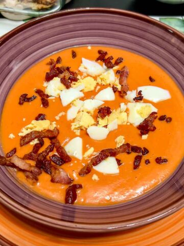 Spanish Porra Soup served with boiled egg and bacon.