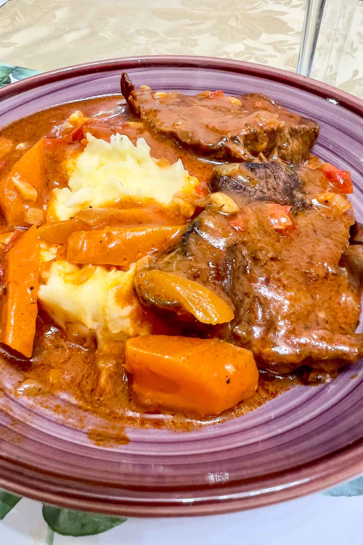 Dutch Oven Beef Pot Roast served with mashed potatoes.