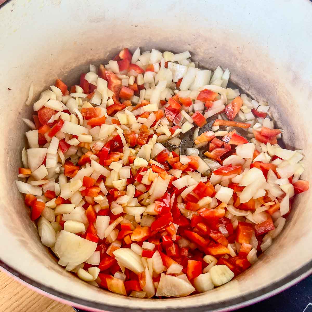Sautéing the vegetables in a Dutch Oven.