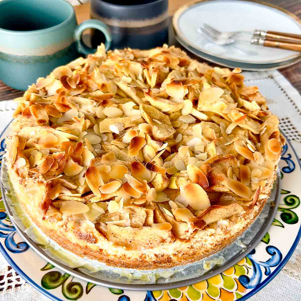 Baked Bavarian apple torte on a platter.