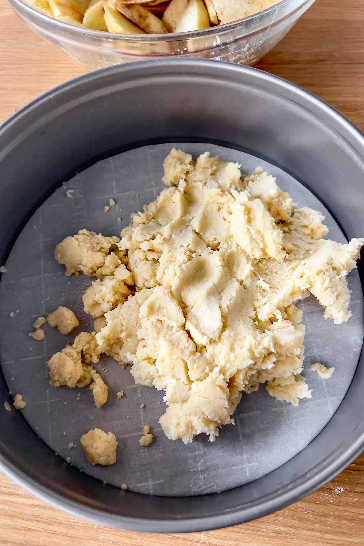 Preparing the pan for the crust.